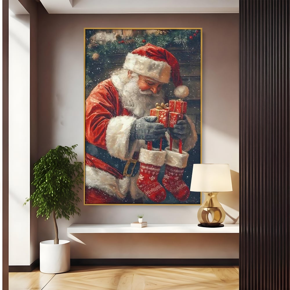 Tablou canvas cu ilustratie cu mos craciun tinand cadouri, in rama de aluminiu auriu